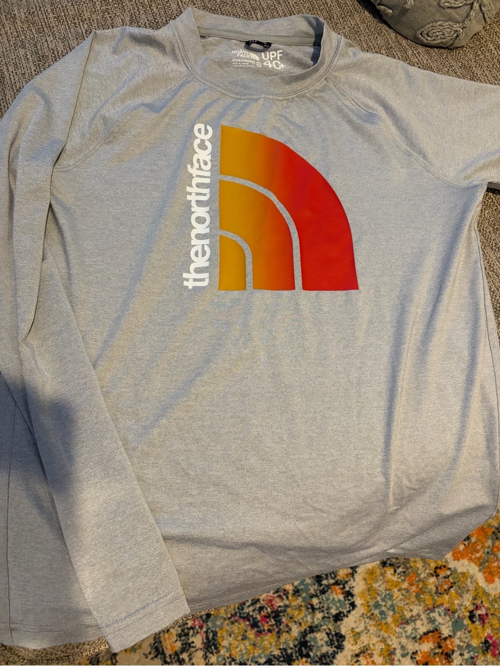 The North Face Kids Long-Sleeve Logo Tee in Light Gray with Red-Orange Graphic